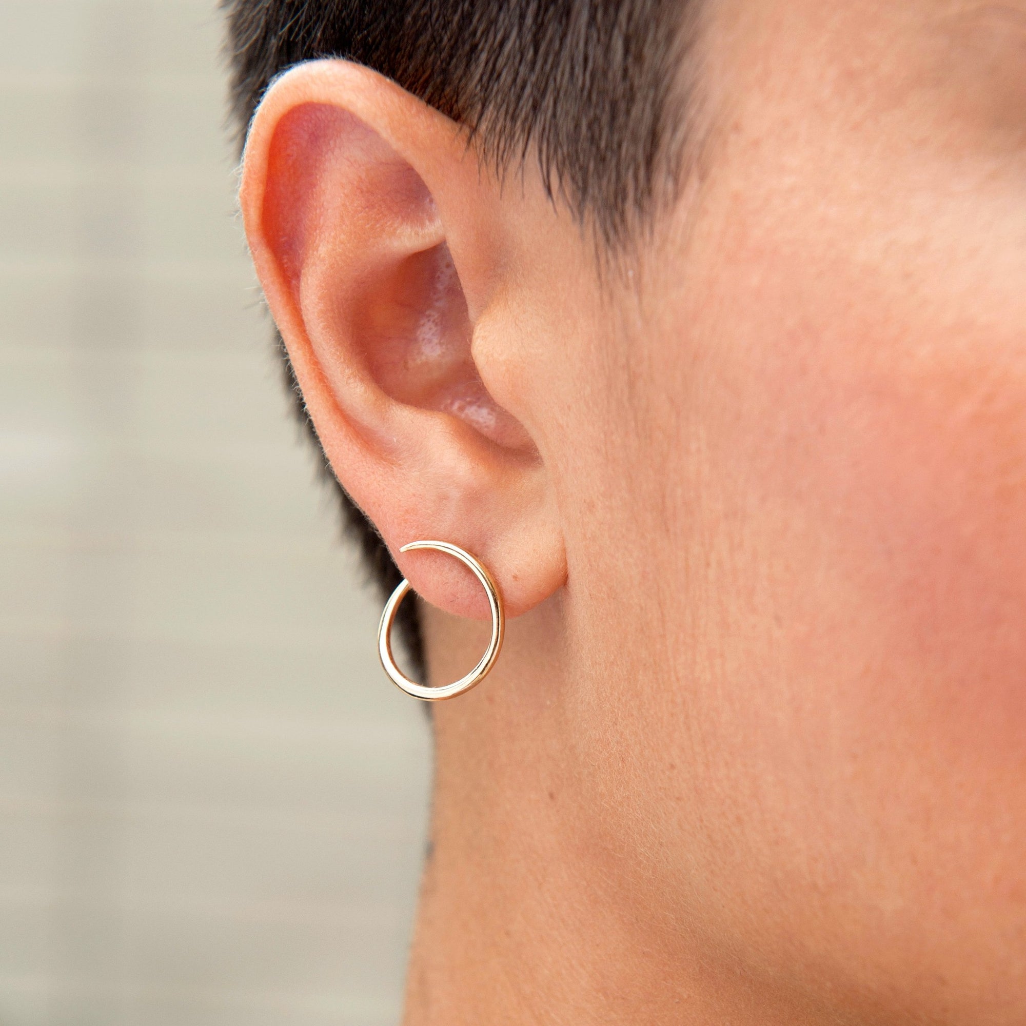 Picture of Esme Loop Gold Hoop Earrings on body  White Space Jewelry